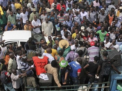 Protesters gather during a rally against fuel subsidy removal on Ikorodu road in Lagos.